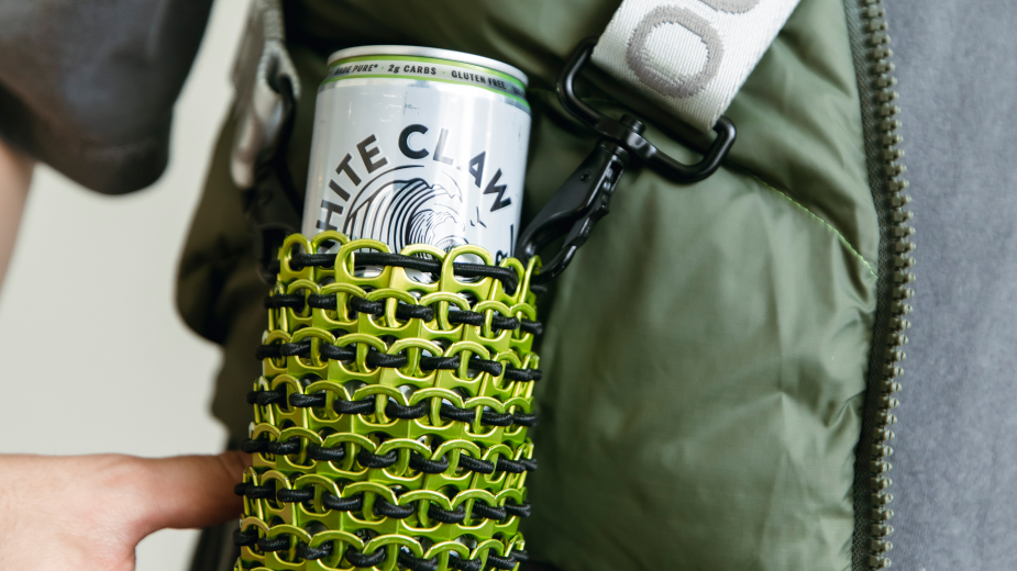 White Claw in a green bag
